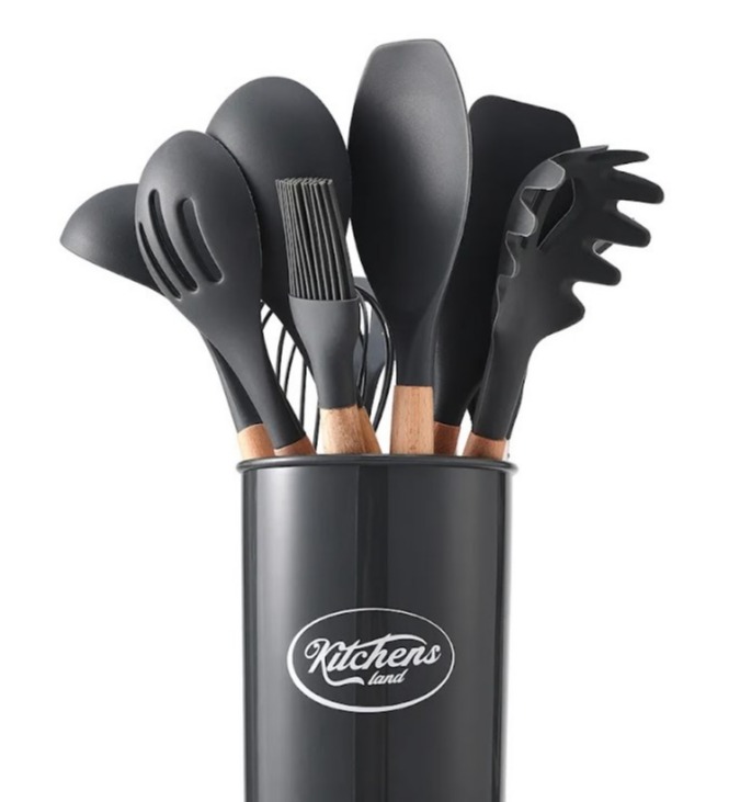 Set of black silicone kitchen utensils in a gray canister.