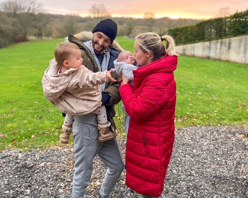 Tom Parker's wife Kelsey with their two children.