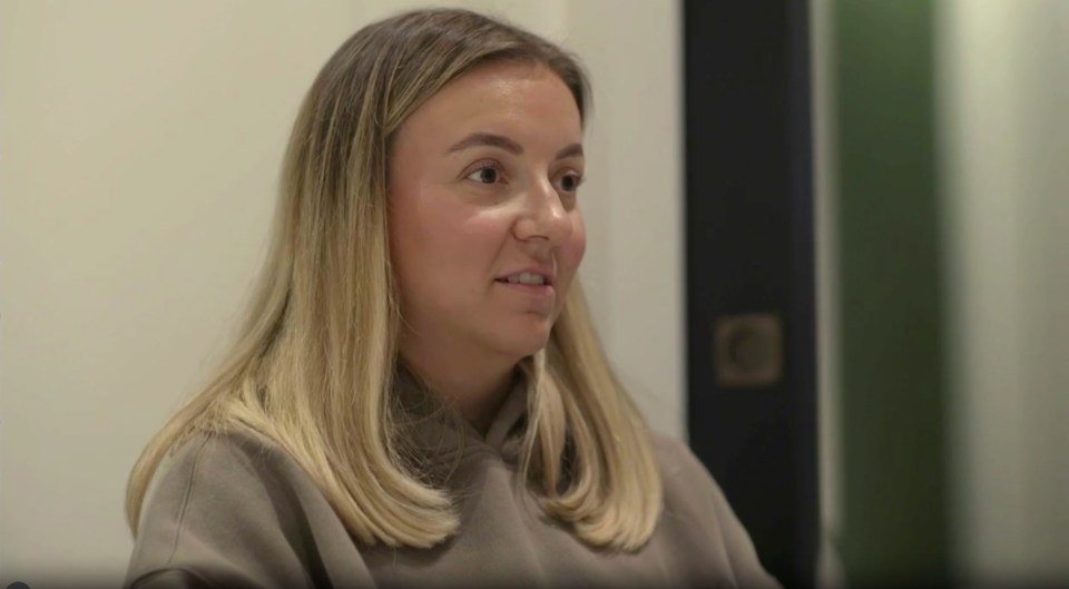 Screenshot of a blonde woman speaking.