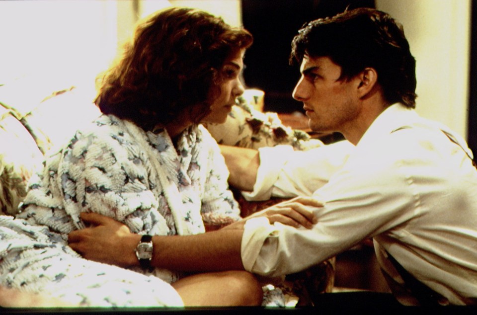 Jeanne Tripplehorn and Tom Cruise on the set of *The Firm*.