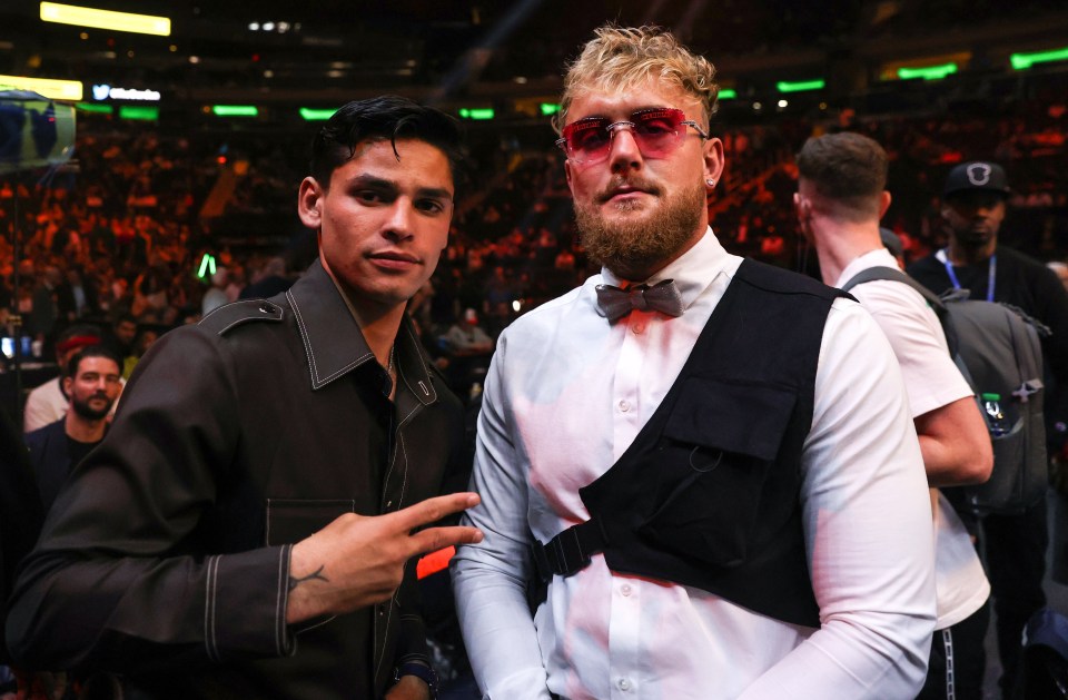 Ryan Garcia and Jake Paul posing together.