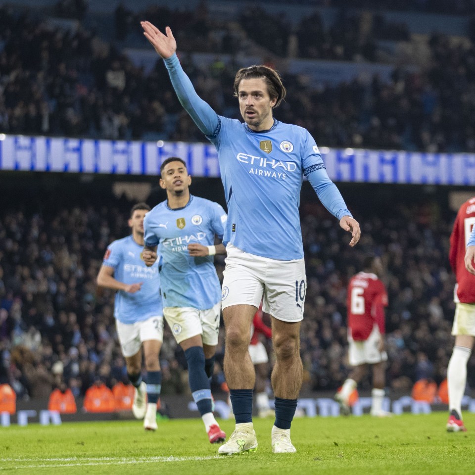 Jack Grealish of Manchester City celebrates scoring a penalty.