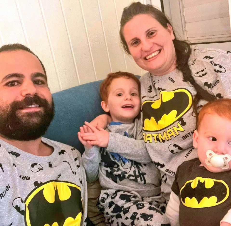 Photo of an Israeli family wearing Batman pajamas.