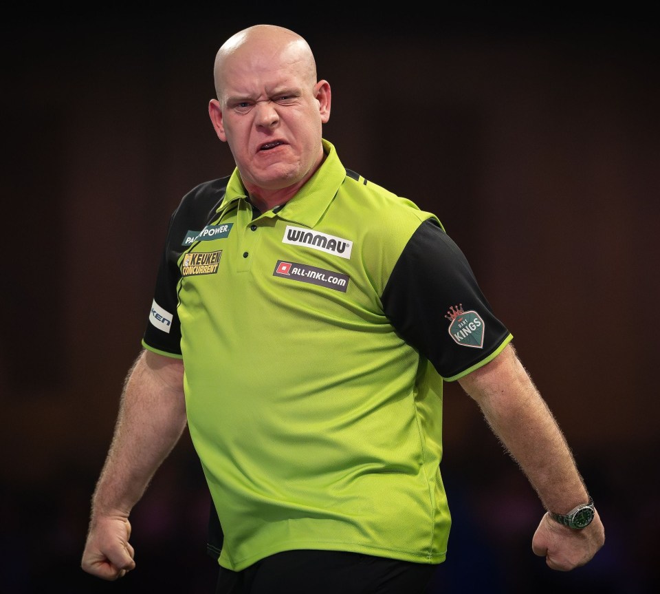 Michael van Gerwen reacting during a World Darts Championship quarter-final match.