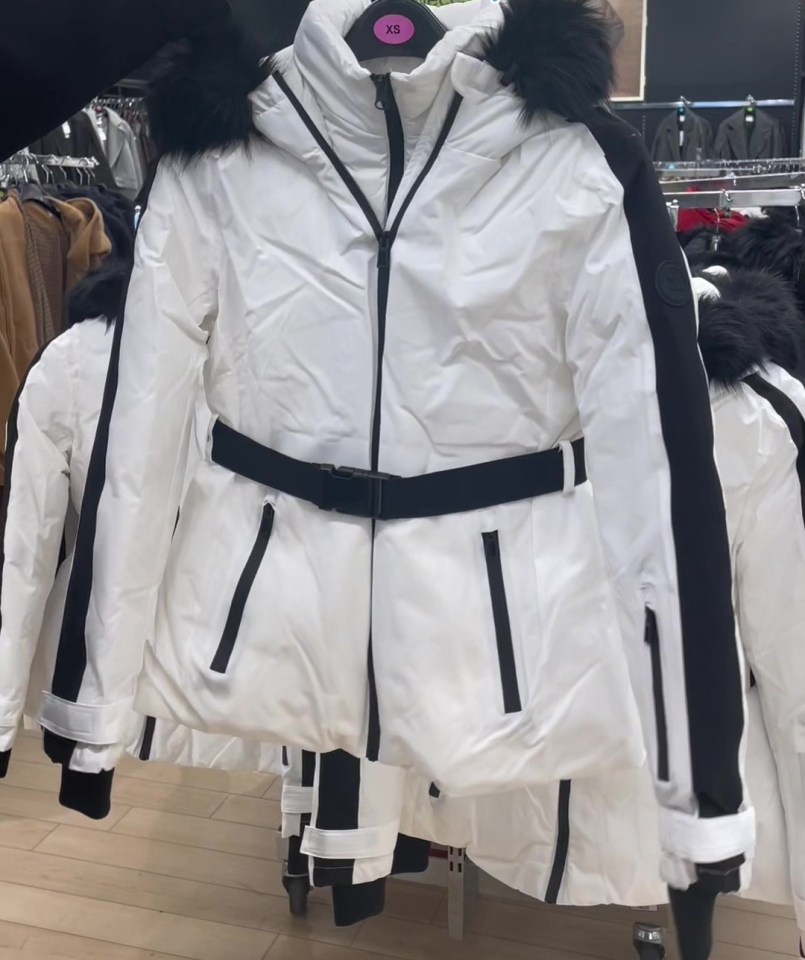 White après-ski jacket with black trim.