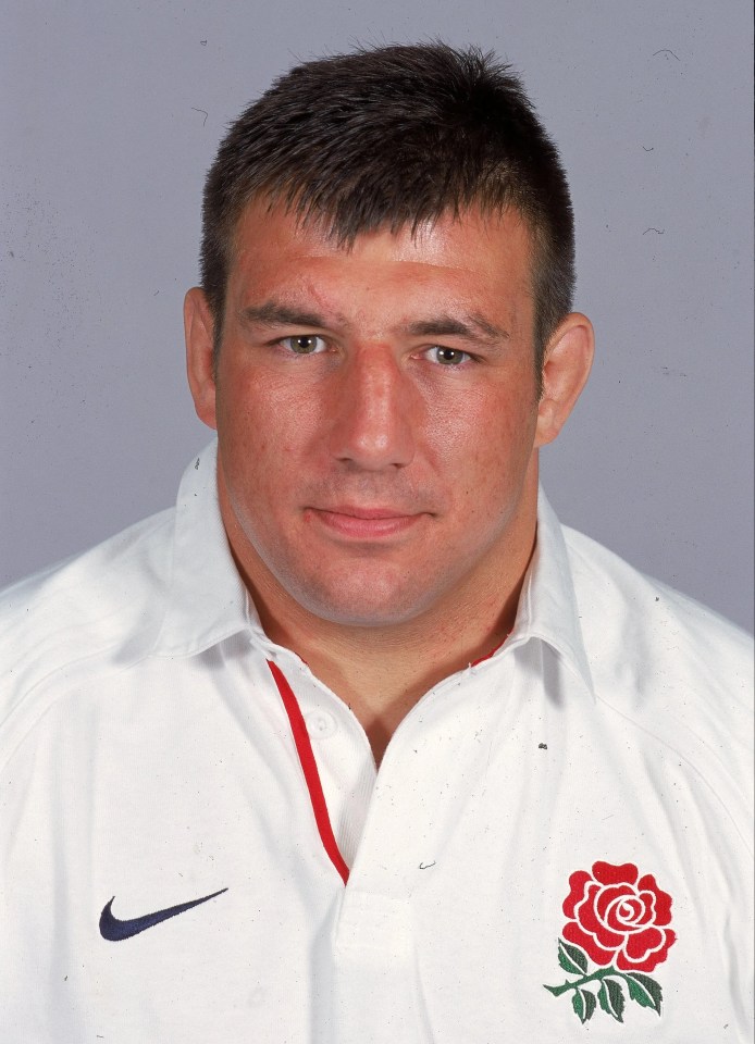 Portrait of Julian White in an England rugby shirt.