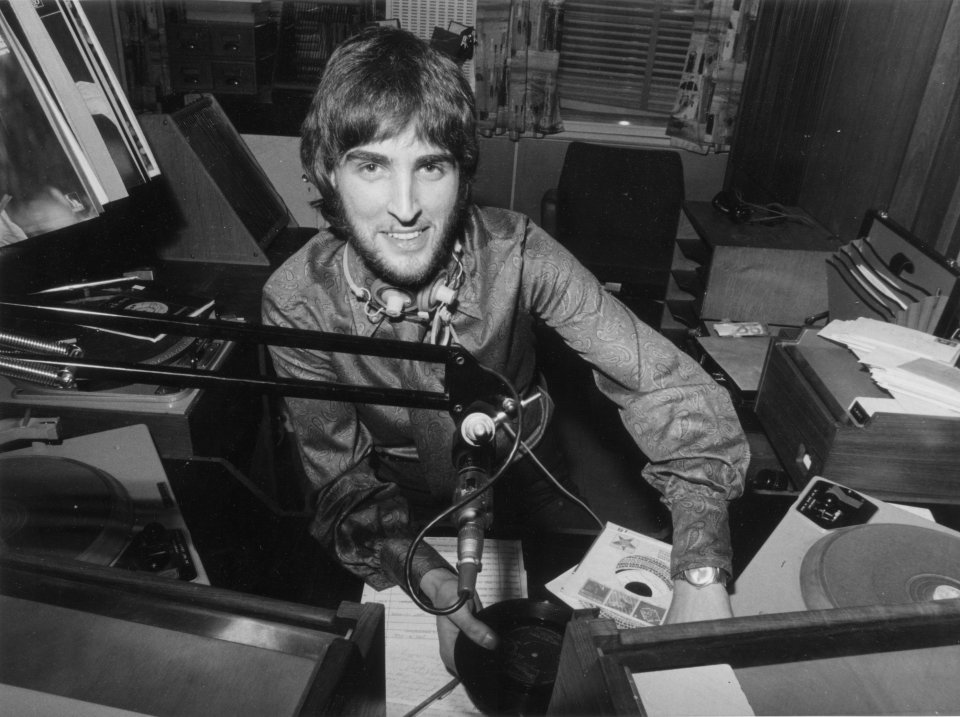 BBC Radio disc jockey Johnnie Walker in a recording studio.