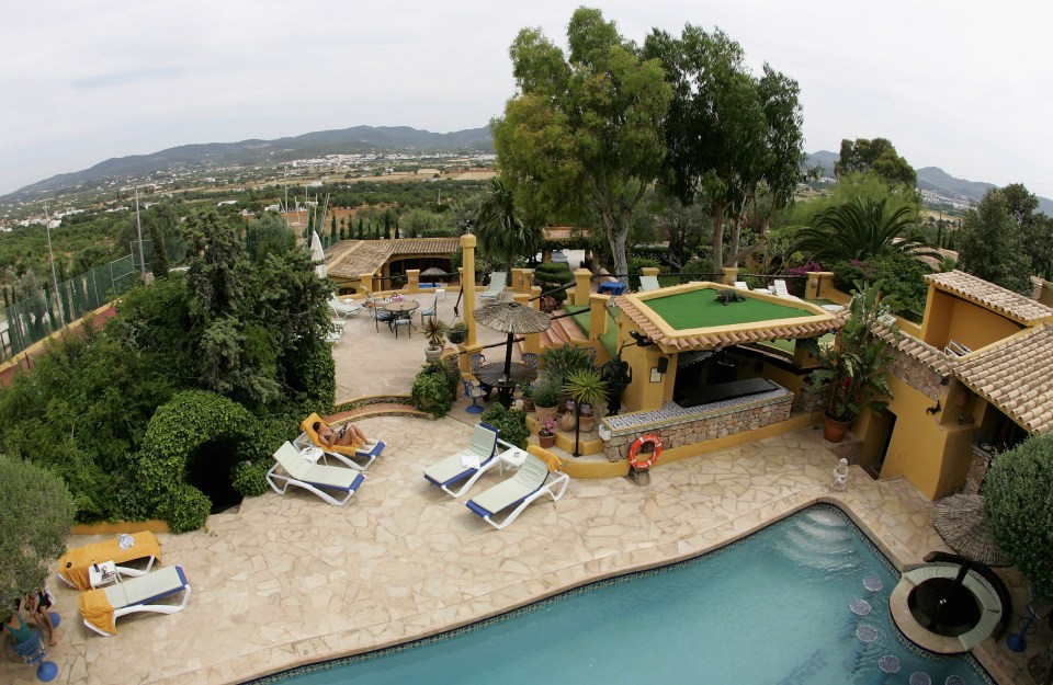 Aerial view of Pike's Hotel in Ibiza, Spain, showing the pool and patio area.