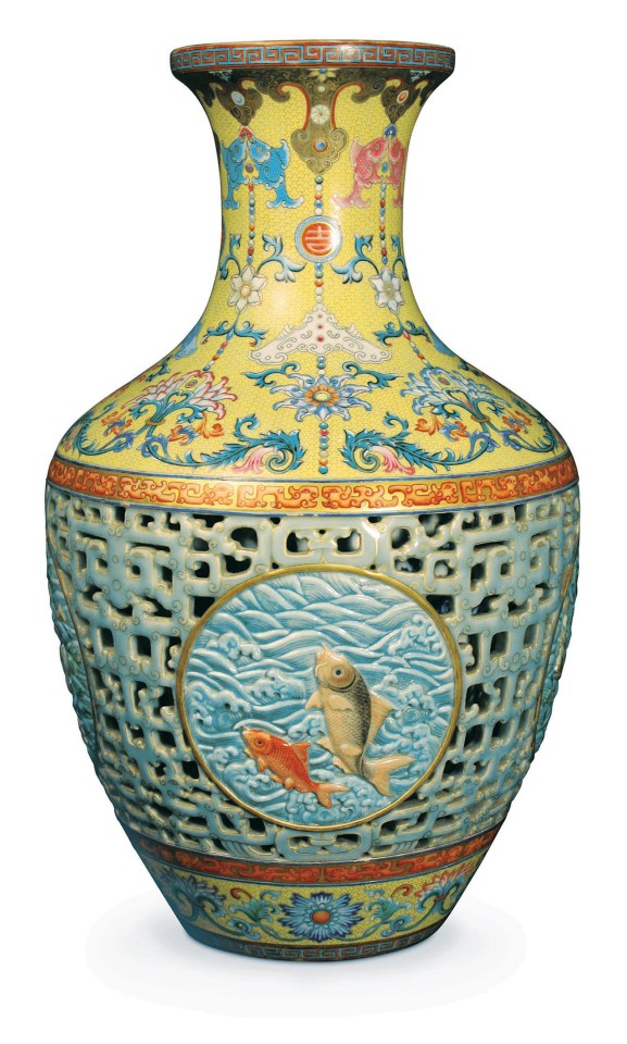 18th-century Qianlong dynasty porcelain vase with fish and floral designs.