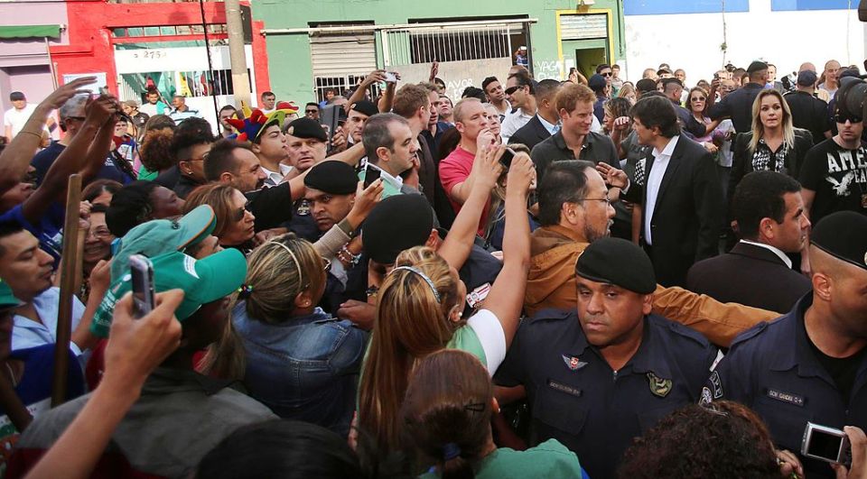 Prince Harry surrounded by a crowd of people in Sao Paulo, Brazil.