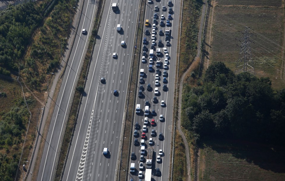 Aerial view of a traffic jam on a UK motorway.