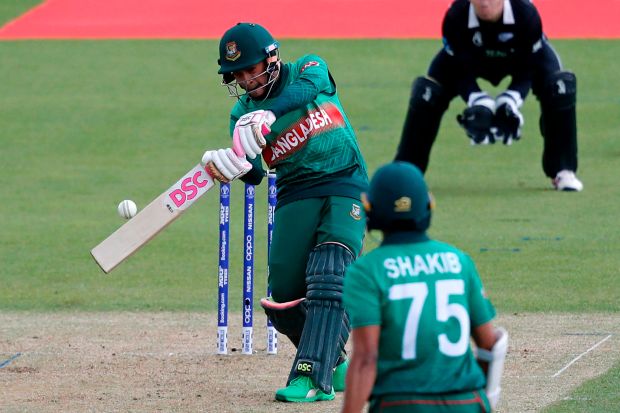 Bangladesh cricket player hitting a ball.