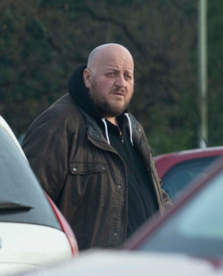 Adrian Bayford, lottery winner, leaving a Tesco.