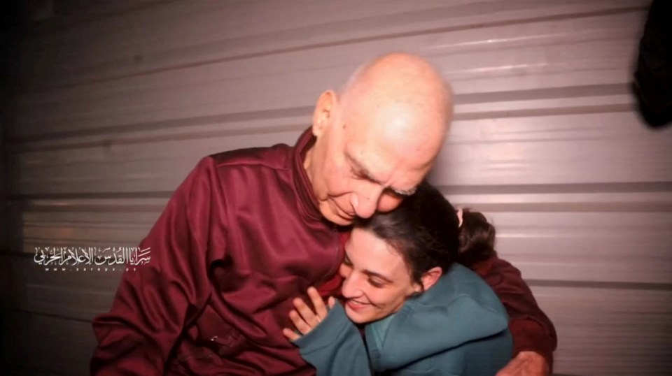 Screengrab of Arbel Yehoud and Gadi Moses embracing after their release from captivity.