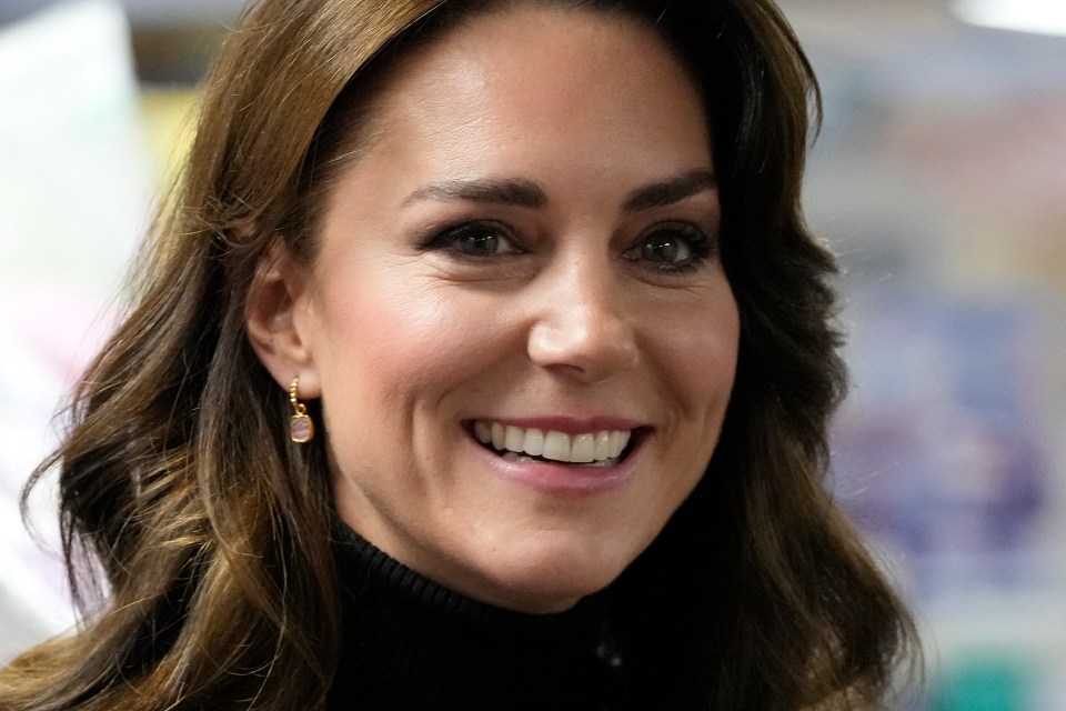 Close-up portrait of Kate, Princess of Wales, smiling.