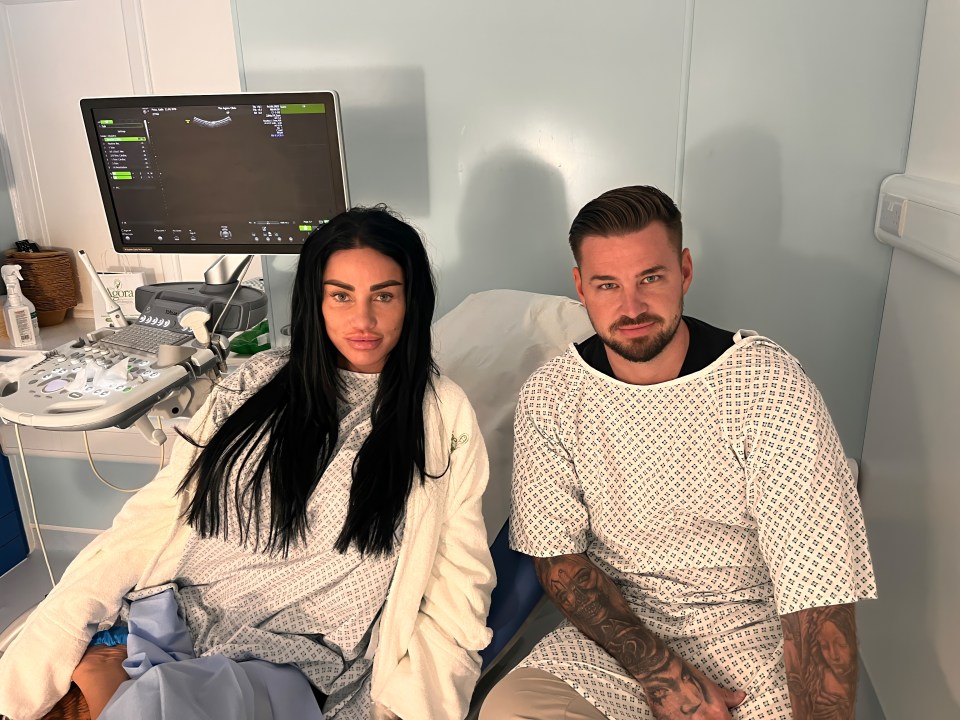 Katie Price and Carl Woods in hospital gowns during IVF treatment.