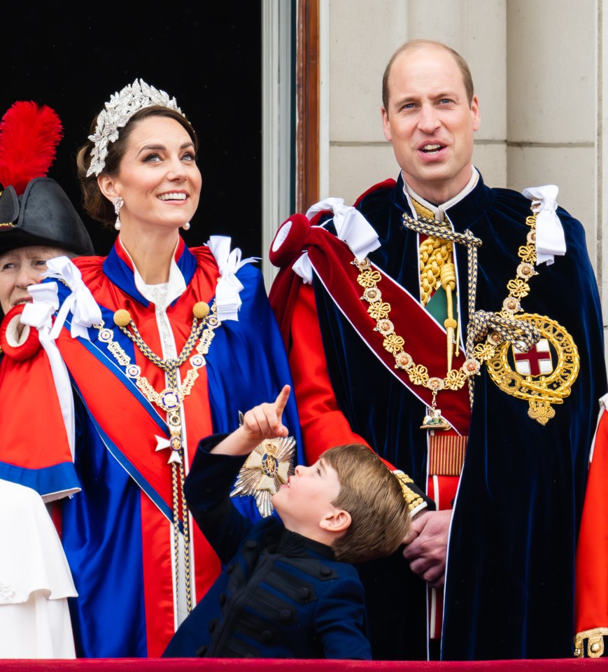 Prince William, Catherine, Princess of Wales, and Prince Louis on the Buckingham Palace balcony after the Coronation of King Charles III.