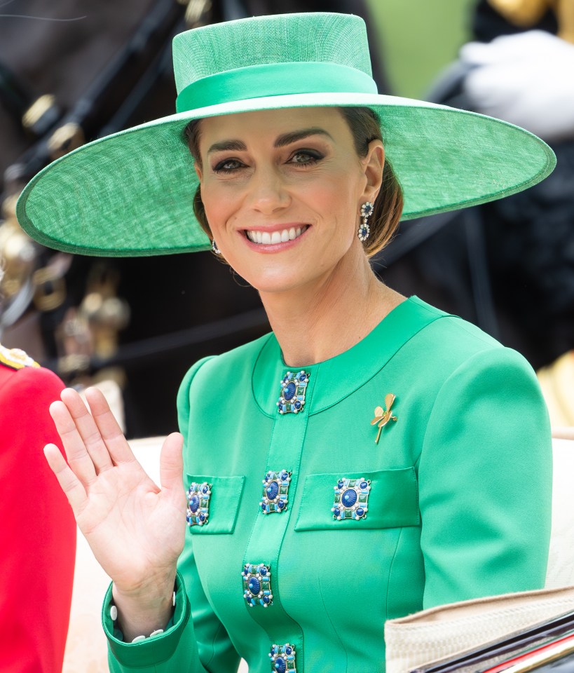 Catherine, Princess of Wales, waving from a carriage at Trooping the Colour.