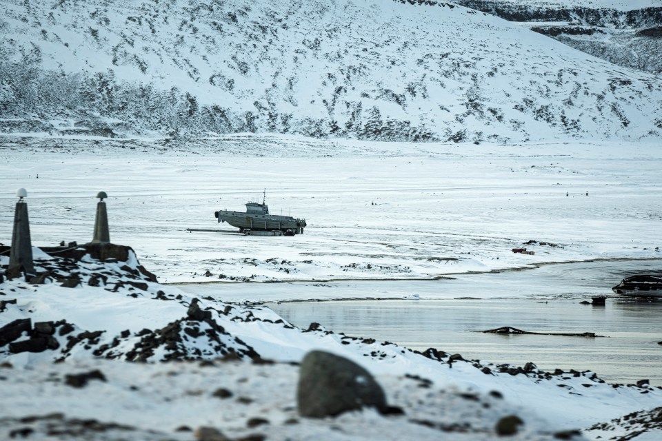 A boat on the shore of Pituffik Space Base in Greenland.