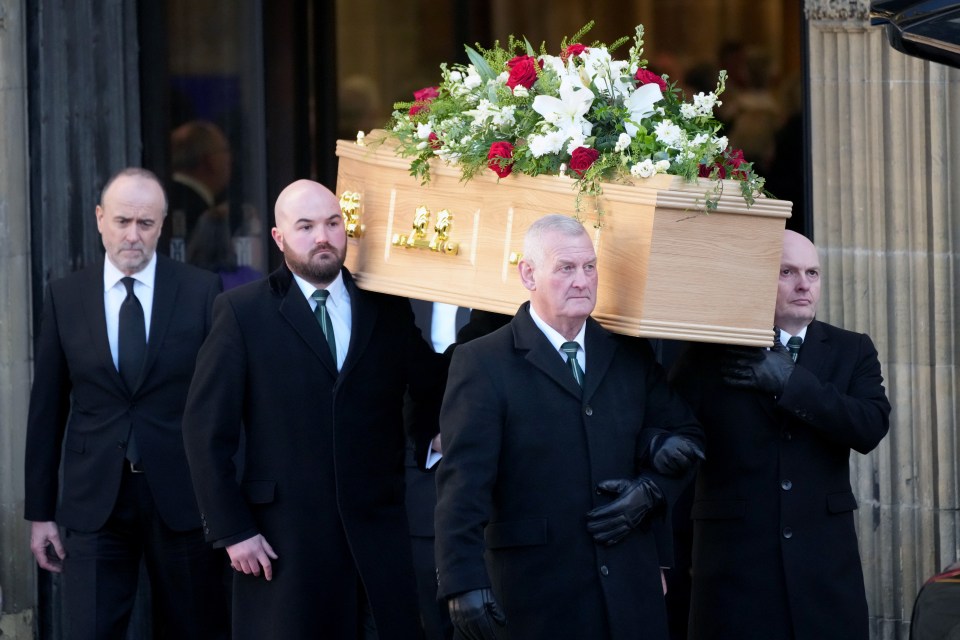 Pallbearers carrying Lord John Prescott's coffin.