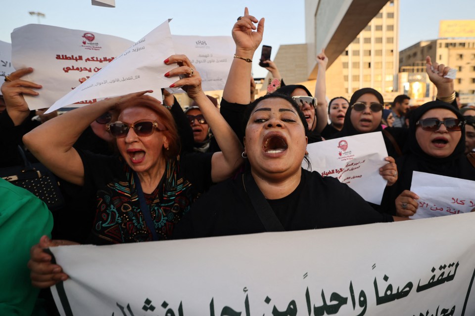 Iraqi women protesting against a proposed law that would reduce women's rights.