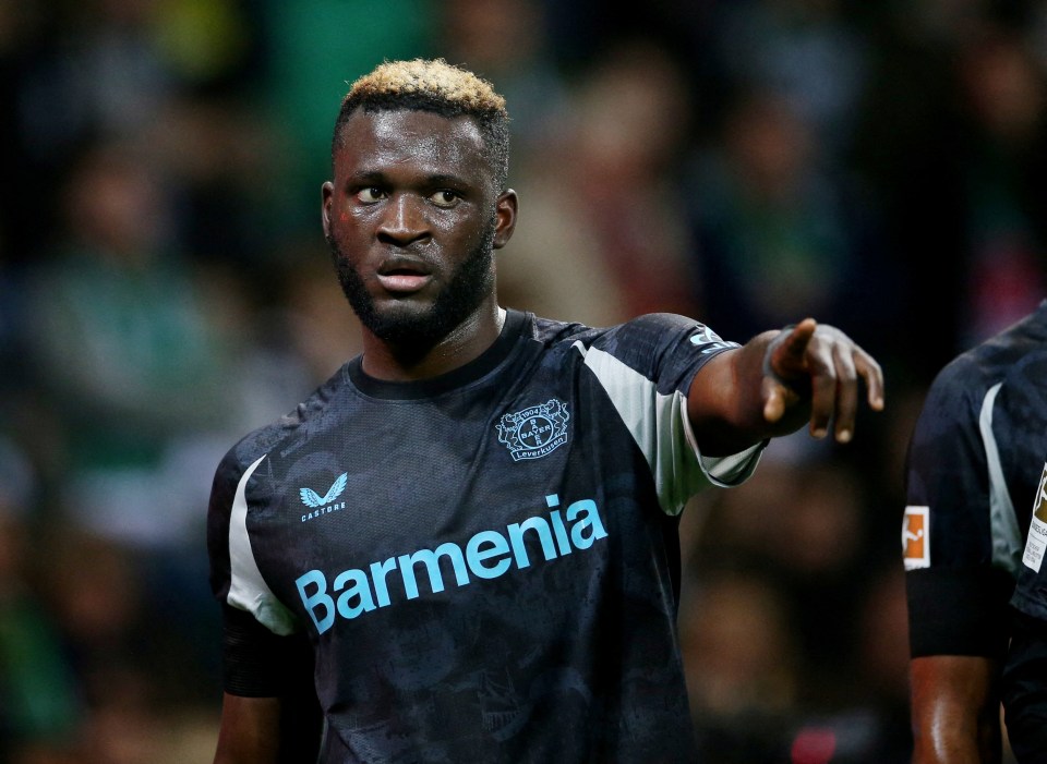 Victor Boniface of Bayer Leverkusen celebrating a goal.