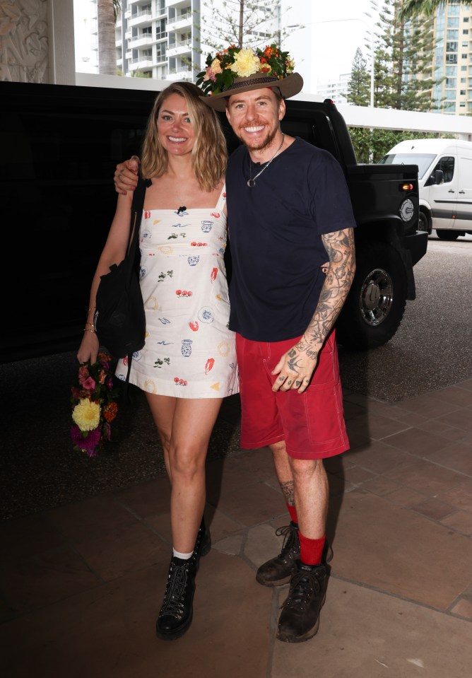 Georgia Horsley and Danny Jones at a hotel after winning a reality TV show.