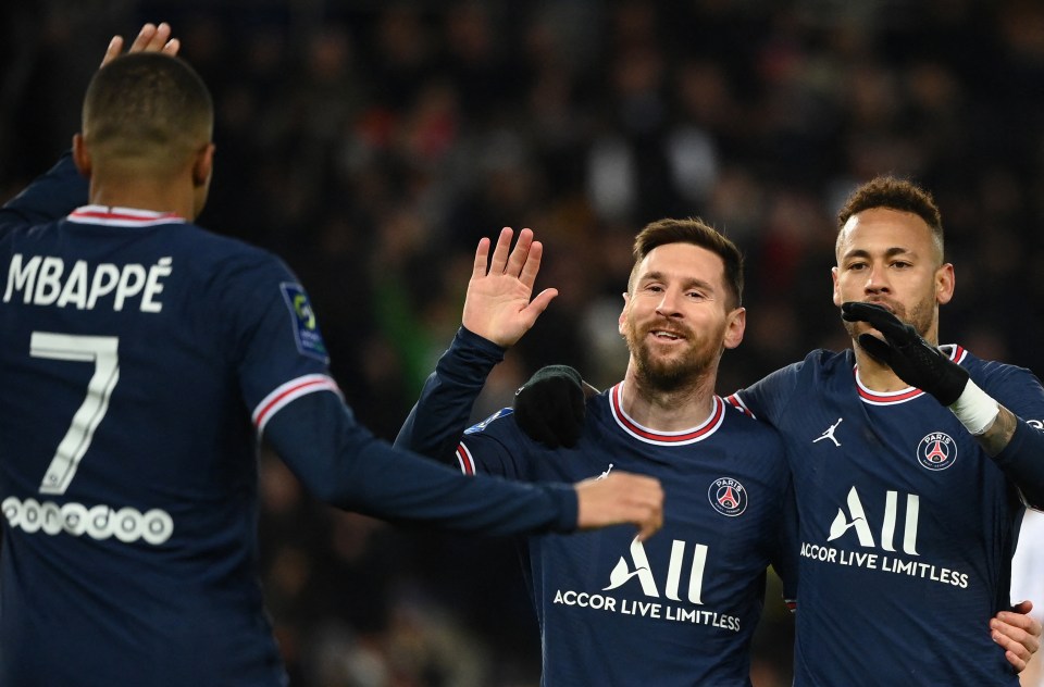 Mbappé, Messi, and Neymar celebrating a goal.