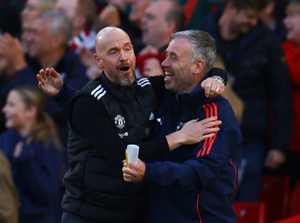 Erik ten Hag and Rene Hake, Manchester United's manager and assistant manager, celebrating.