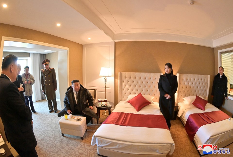 Kim and his daughter visit a room in one of the resort's hotel