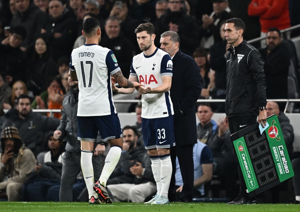 Ben Davies of Tottenham Hotspur substitutes in a soccer match.