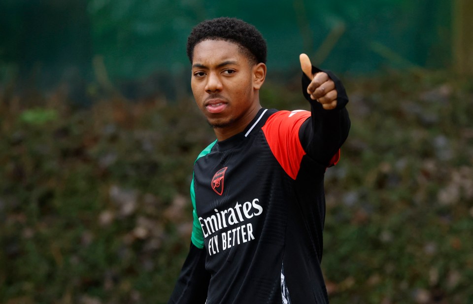 Myles Lewis-Skelly of Arsenal gives a thumbs up.