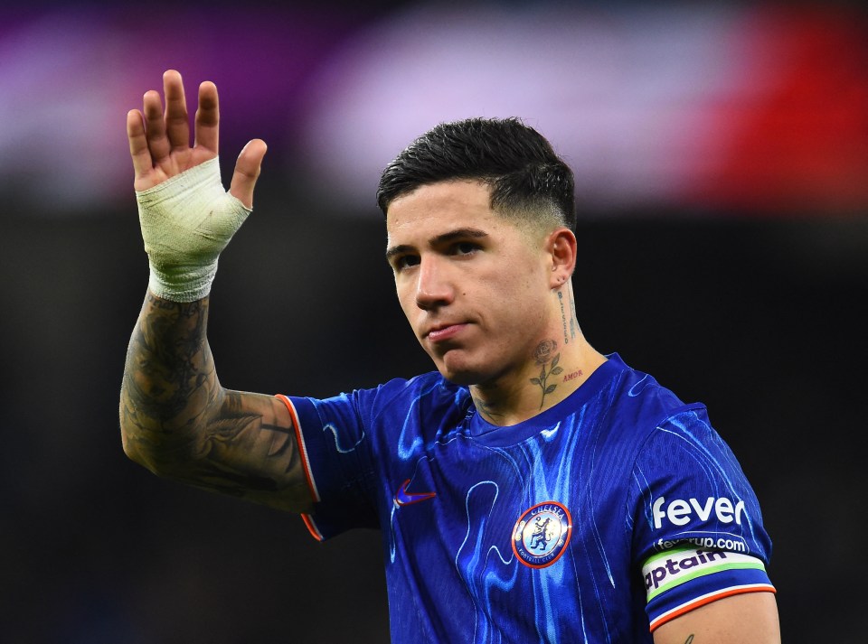 Enzo Fernandez of Chelsea waving to fans.