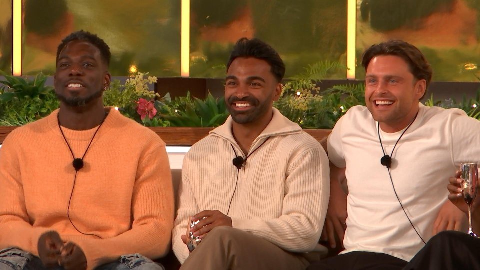 Three men from Love Island sitting on a couch.