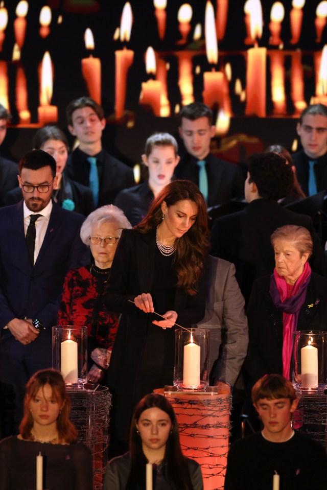 Catherine, Princess of Wales lighting a candle at a Holocaust Memorial Day ceremony.