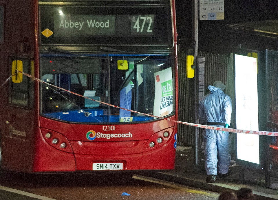 Police and forensic officers inside a cordon on Tuesday night