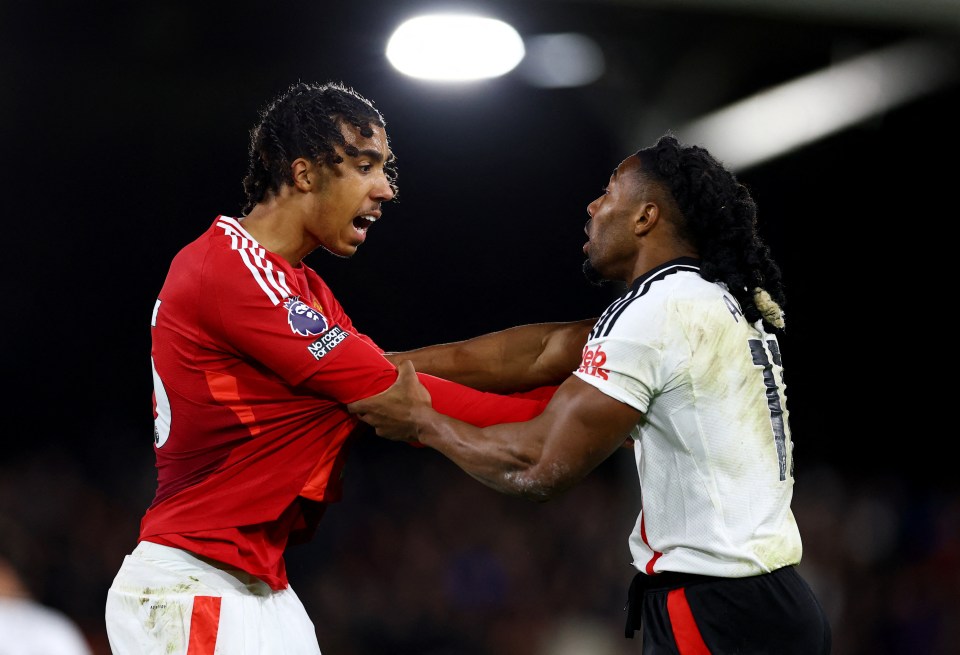 Manchester United's Leny Yoro and Fulham's Adama Traore during a soccer match.