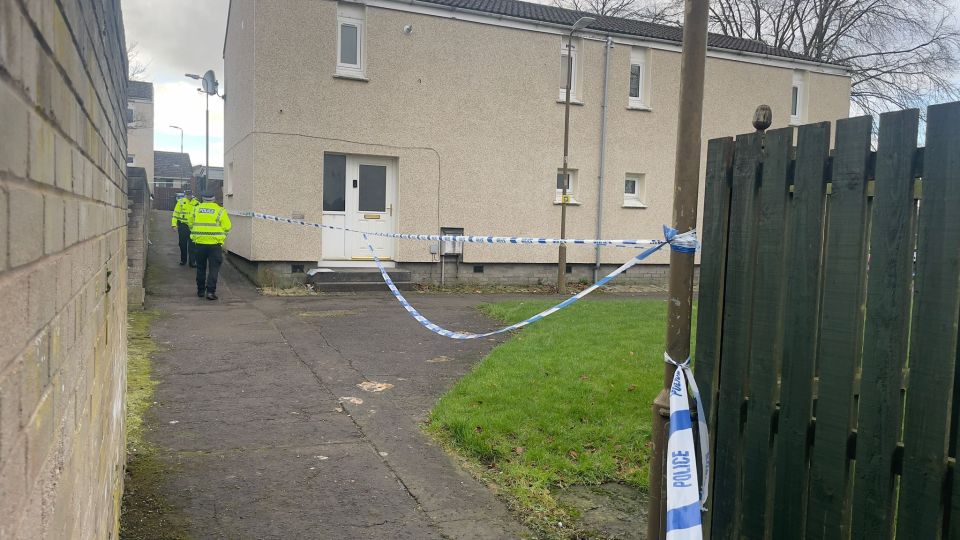 Police officers at a crime scene.