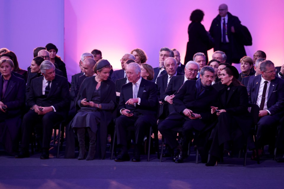 King Charles III and other world leaders attending a ceremony at Auschwitz.