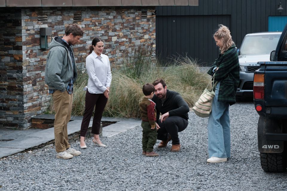 Still from the ITV psychological thriller *Playing Nice*, showing two couples and a toddler.