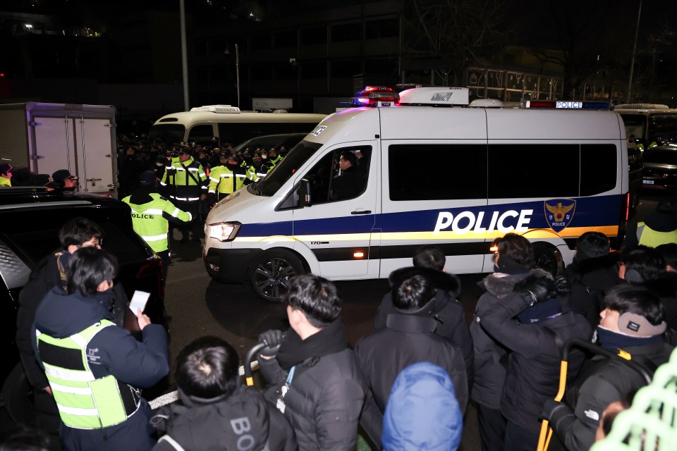 Police van arriving at the residence of impeached South Korean President Yoon Suk Yeol.