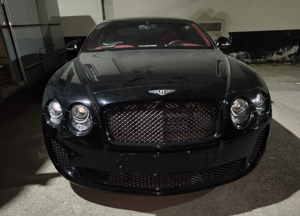 Black Bentley sports car.