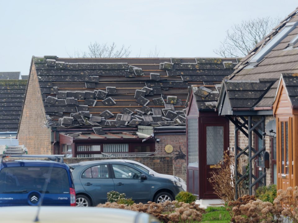 Storm damage to houses in Quinterell Downs, Cornwall, UK.