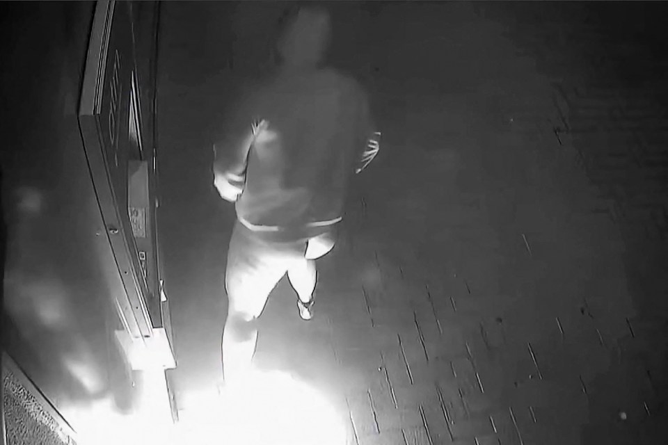 CCTV footage of arson suspect running after pants catch fire.