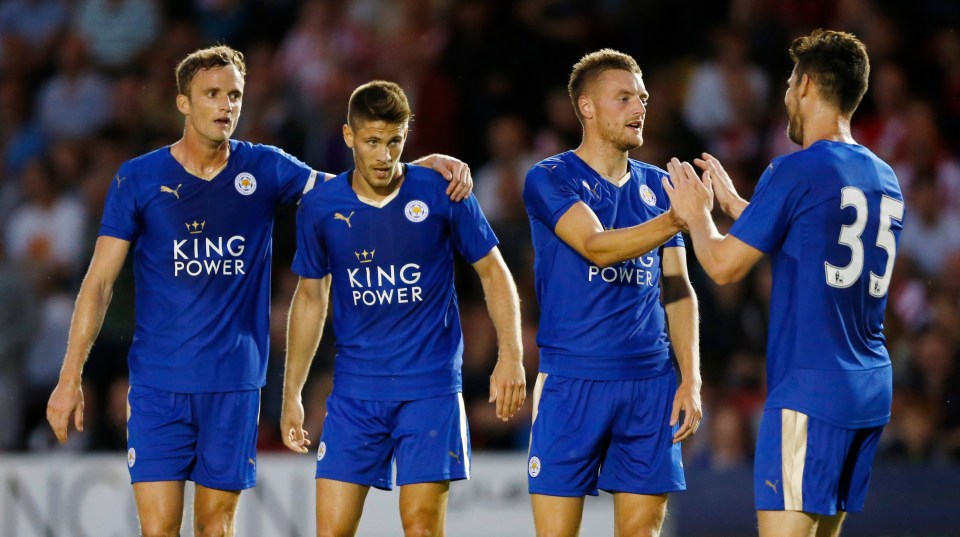 Leicester City players celebrating a goal.