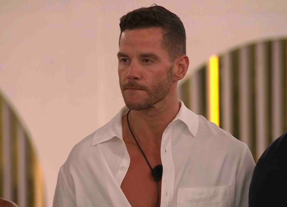 Screenshot from Love Island showing Scott Thomas and Luca Bish.