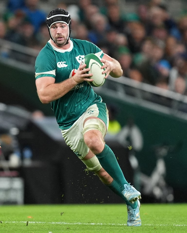 Caelan Doris, Irish rugby player, running with the ball.