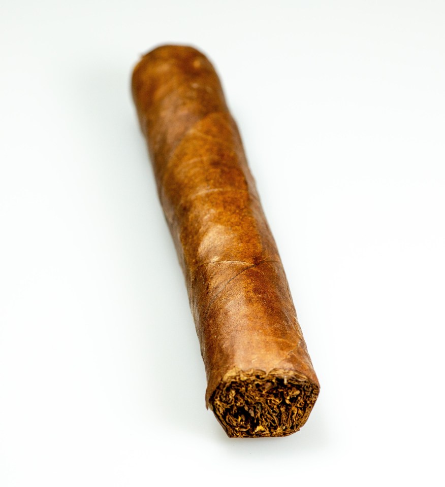 Brown Cuban cigar.