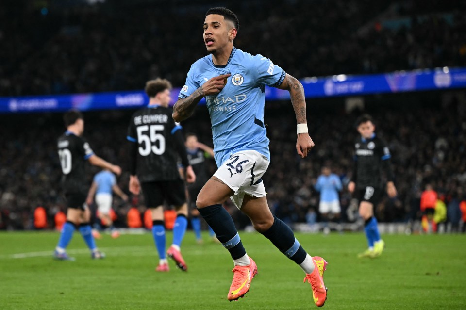 Manchester City's Savinho celebrating a goal.