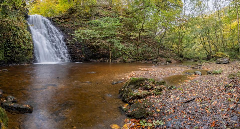 Panoramic view of Falling Foss waterfall in the North York Moors.